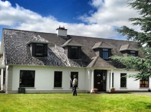 Soft Washing of a roof using AlgoClear: for long lasting moss and lichen clearance -  All roof cleaning Services by Roof Repairs Belfast, Northern Ireland