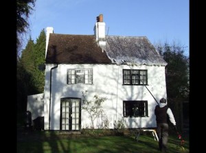 Soft Washing of a roof using AlgoClear: for long lasting moss and lichen clearance -  All roof cleaning Services by Roof Repairs Belfast, Northern Ireland