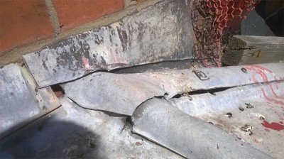Before lead flashing repaired on the roof of a Belfast Home. All Roof Services from Roof Repairs Belfast, Northern Ireland