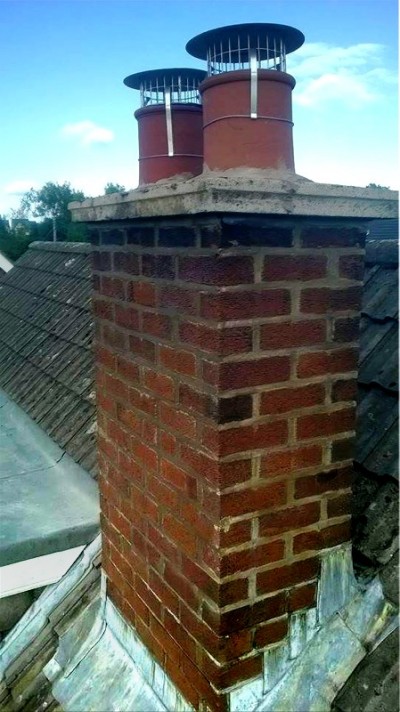 Repair to lead flashing around chimney on Belfast roof by Roof Repairs Belfast, Northern Ireland